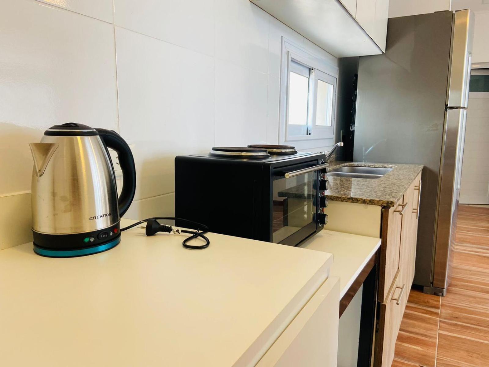 Amplio Y Calido Con Parrilla En El Balcon Apartment โปซาดัส ภายนอก รูปภาพ